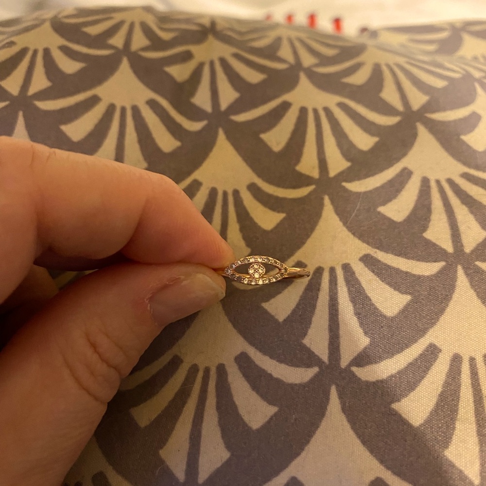 Evil eye rose gold ring.